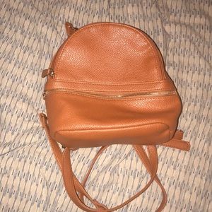 Mini faux brown leather backpack